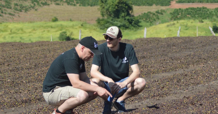 Ian & Jack in a ploughed coffee field Brazil