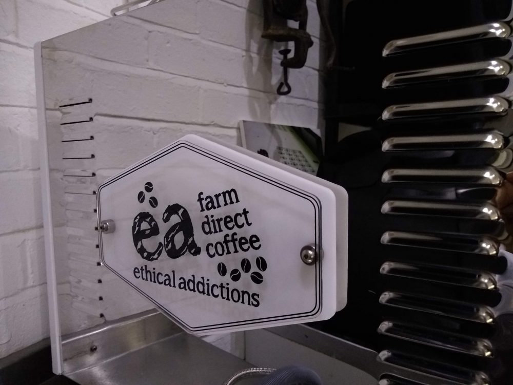 Ethical Addictions Farm Direct Coffee sign on back of Bam2e Fracino