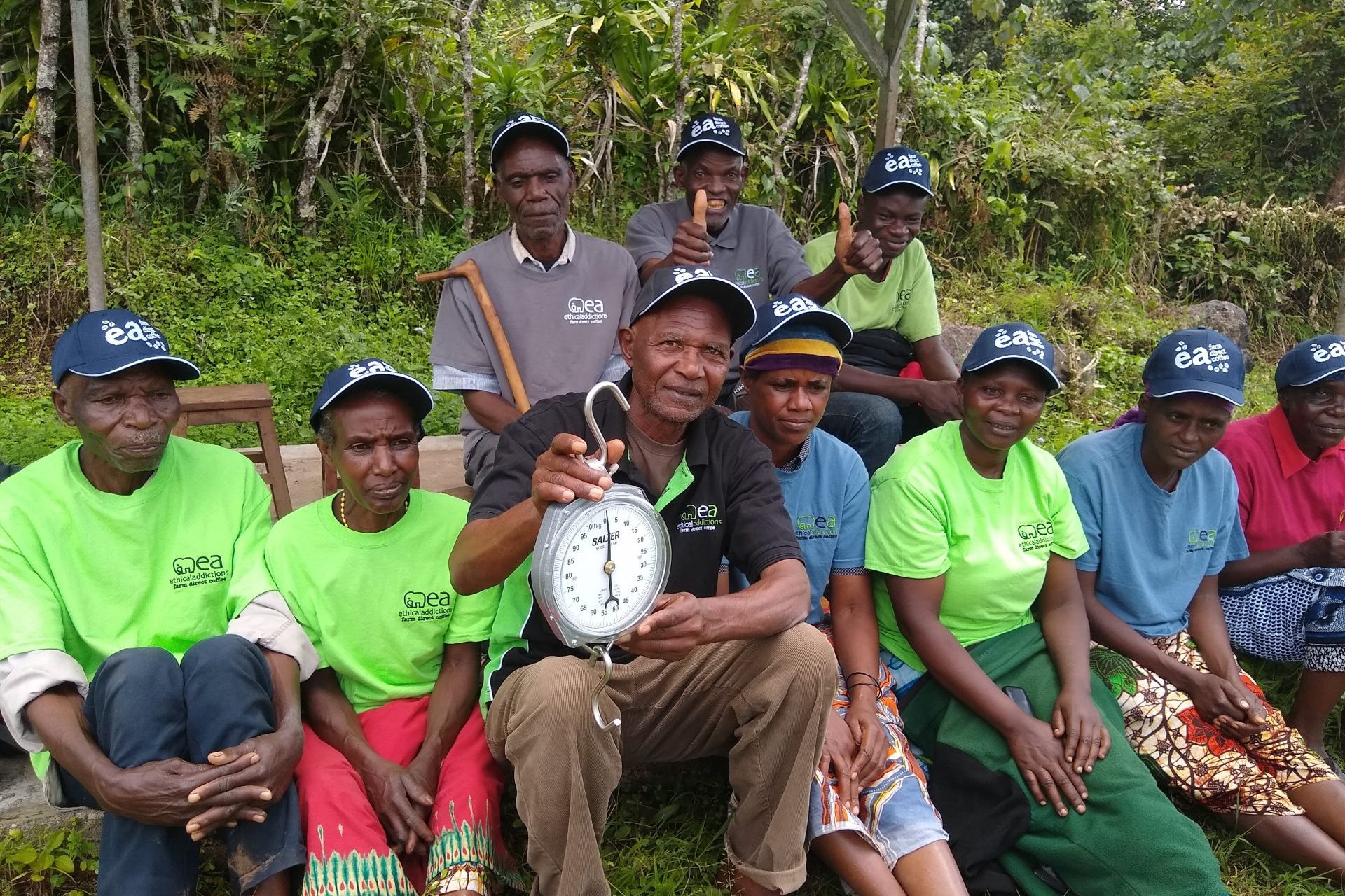 Villagers at the orera villages showing off their new scales donated bu Ethical Addictions
